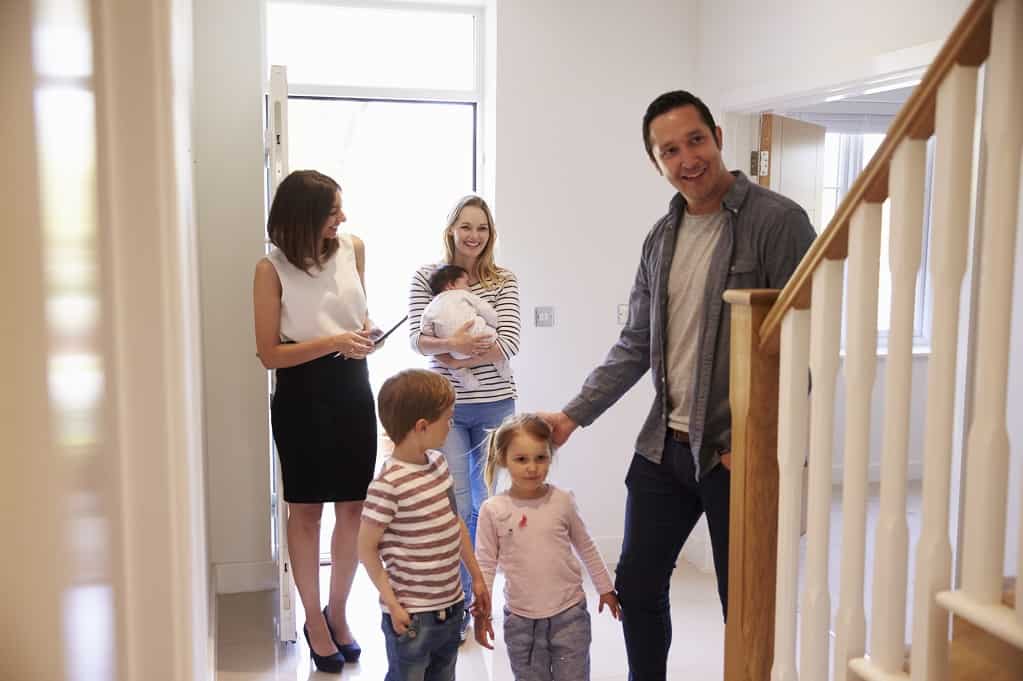 Happy Family and Their New Home Happy Family and Their New Home